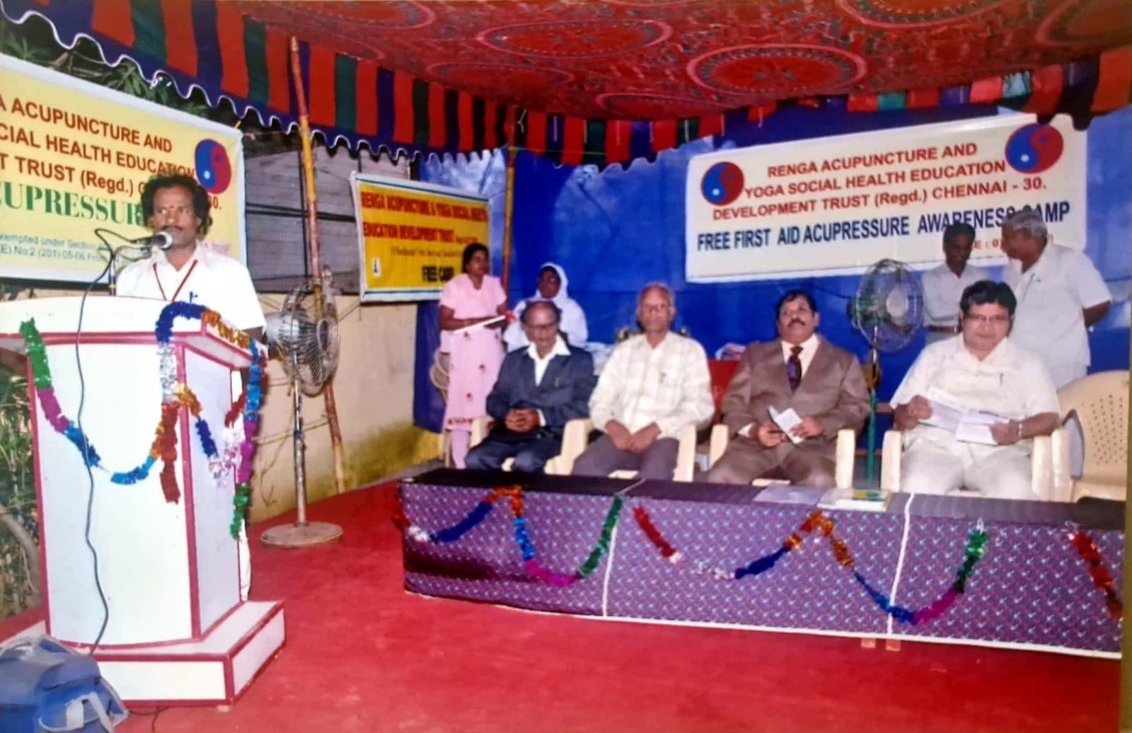 Dr. Ravichandran speaking at the first-aid camp
